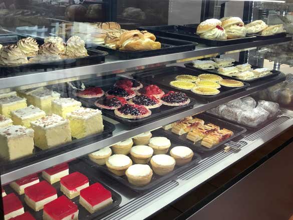 Berry tarts, cream buns, custard tarts, sweet pies